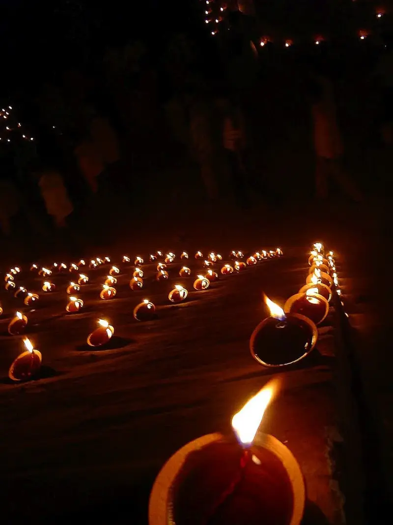 Lit diyas on ghat steps at Dev Deepawali (Varanasi)