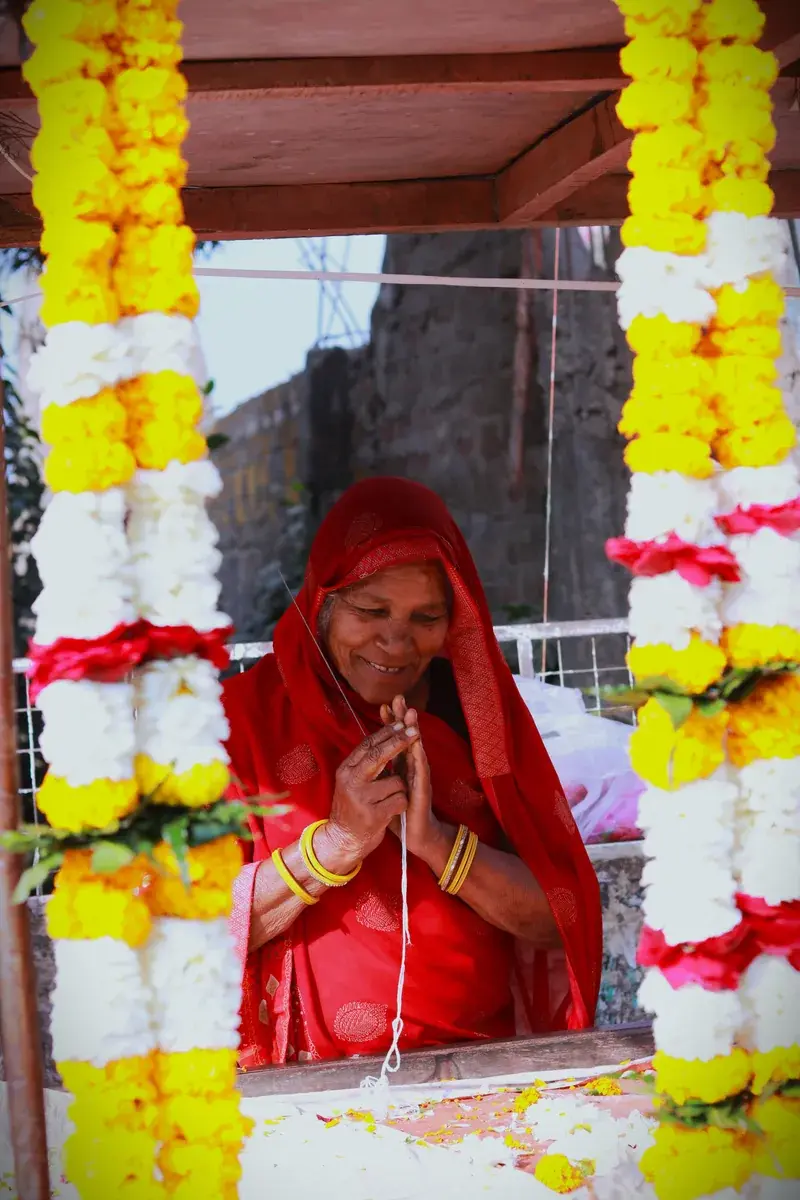 Marigold and jasmine garlands at a flower stall