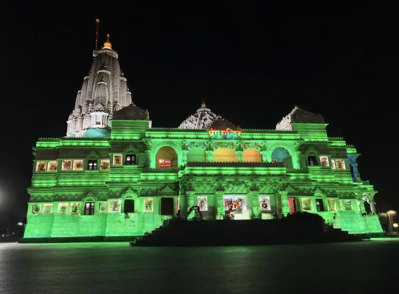 Prem Mandir lit in green at night, Vrindavan