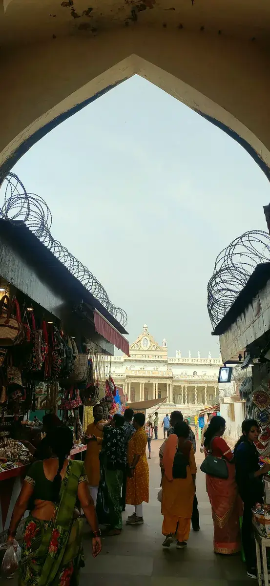 Market lane through an arch in Vrindavan